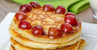 Cerezas en almíbar y naranjas en almíbar para repostería